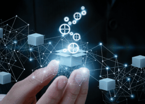 Hand holding an open box with glowing gears floating out of it.